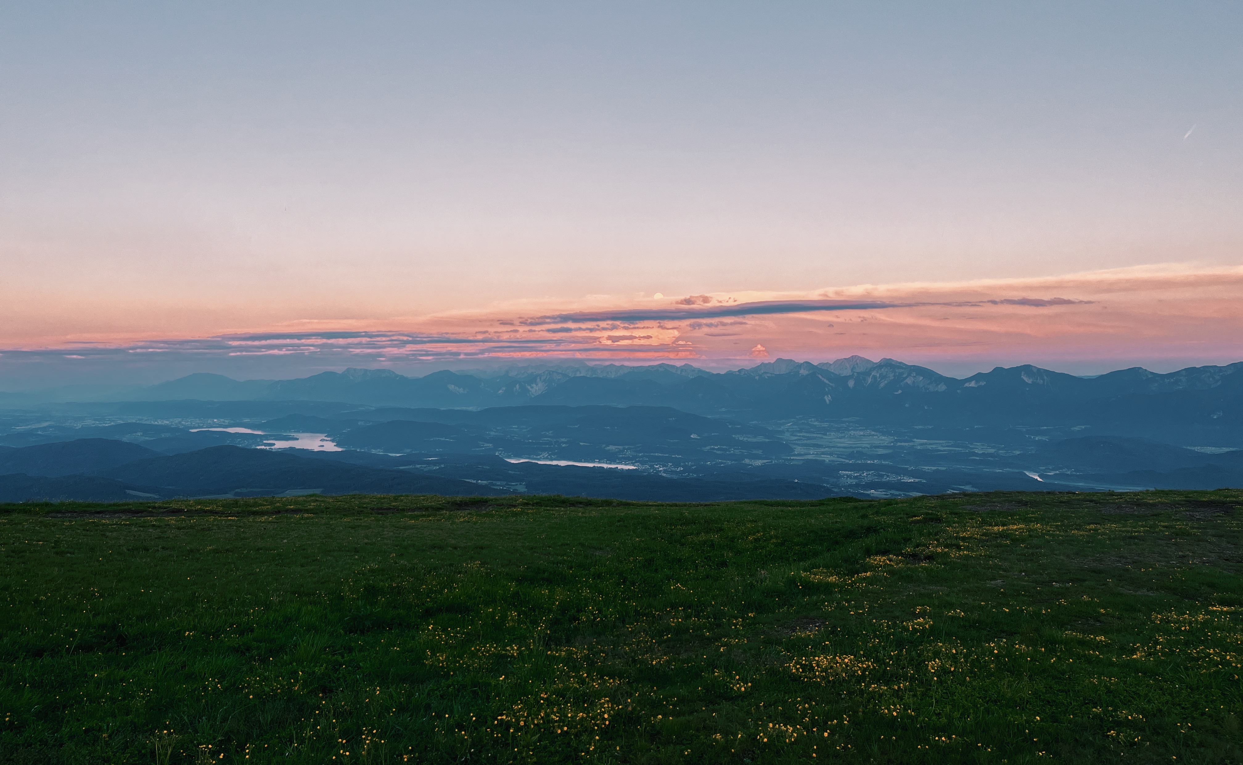 Sunset and moonrise from Gerlitzen Alpe in Austria on the Alpe Adria Trail, the best thru-hiking trail for beginners