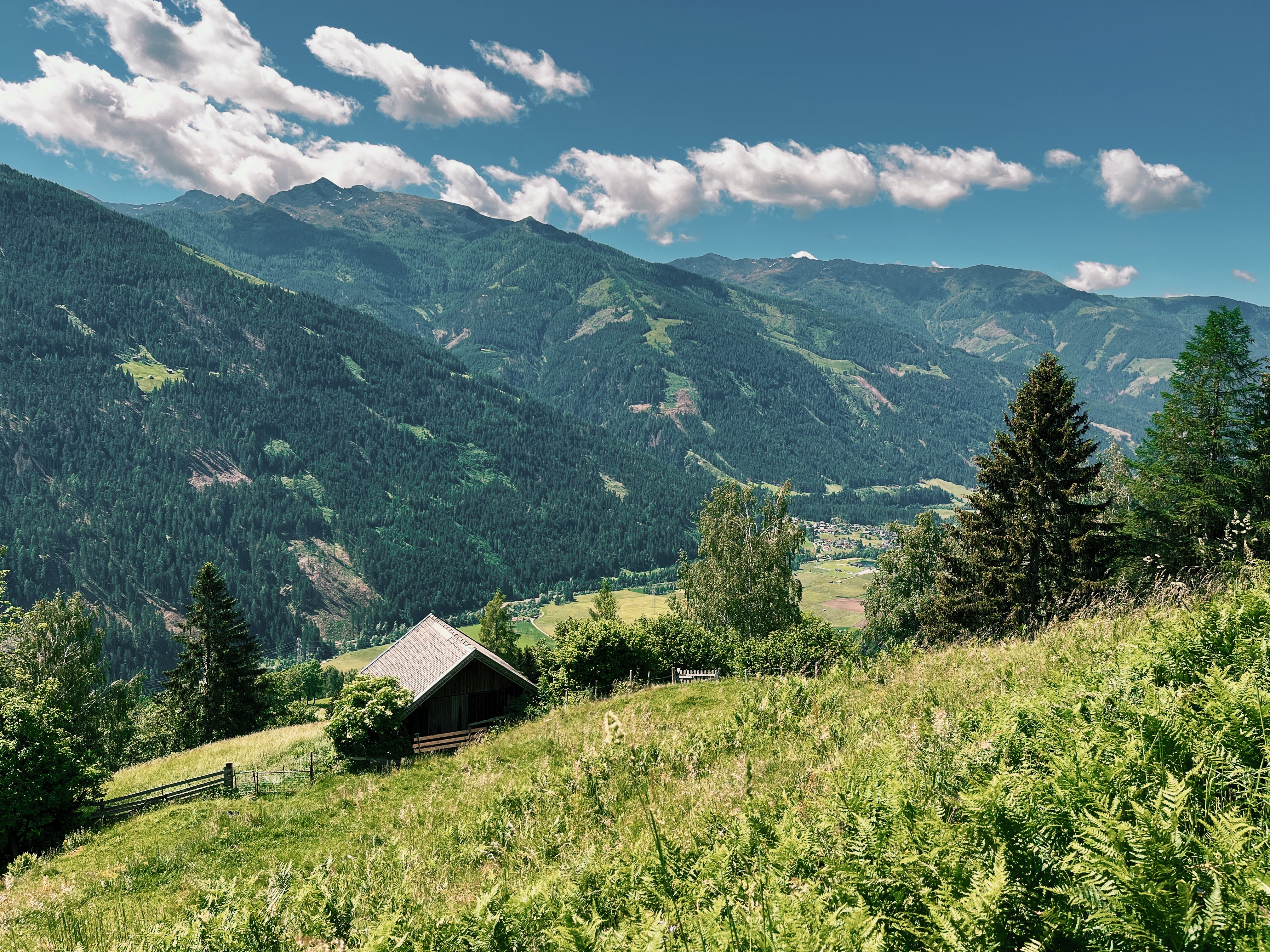 View of Small Mountain Hut and Möll Valley in Austria while Hiking the Alpe Adria Trail