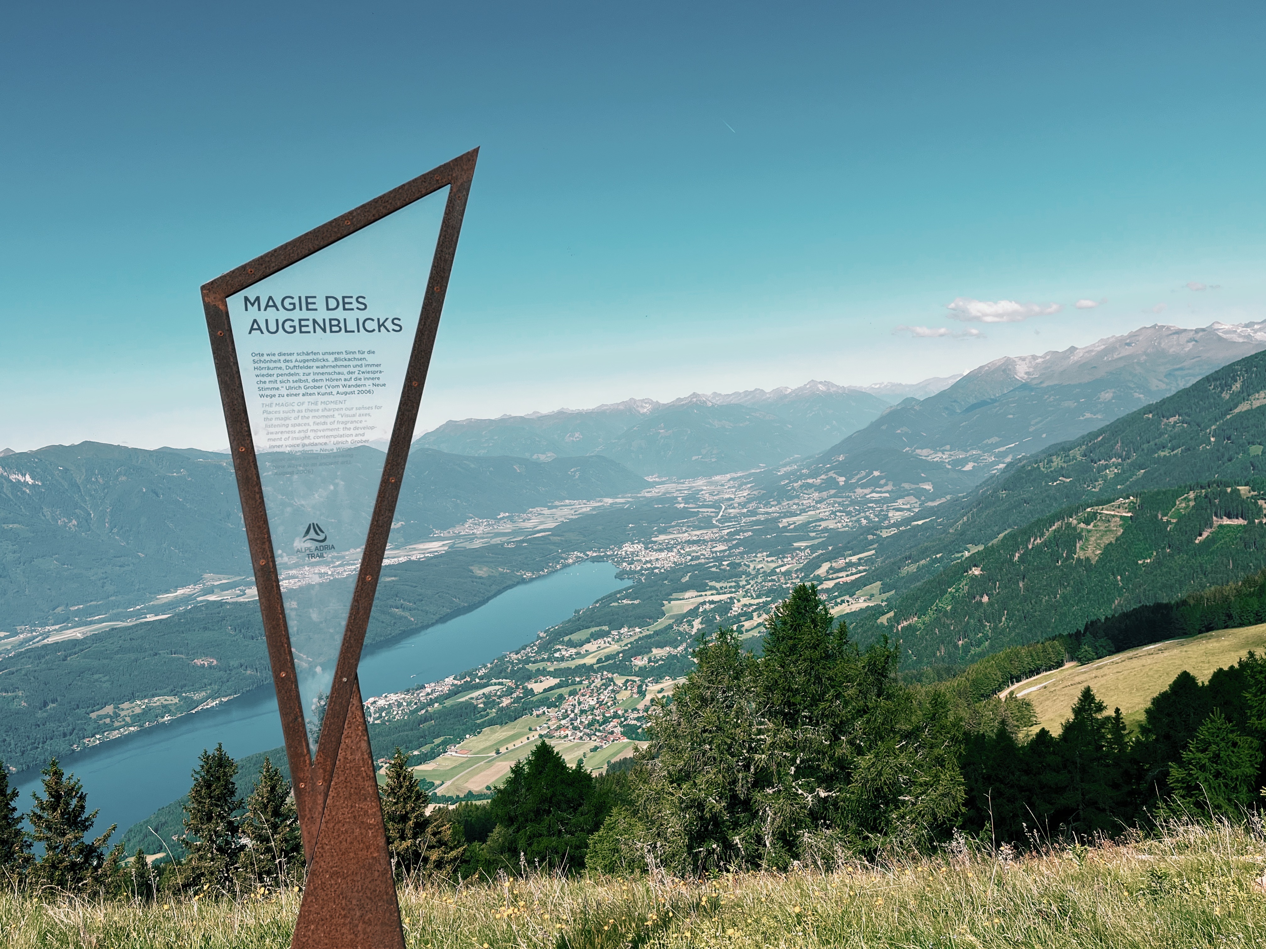 View of Millstätter See und Alexanderalm mountain hut while hiking the Alpe Adria Trail