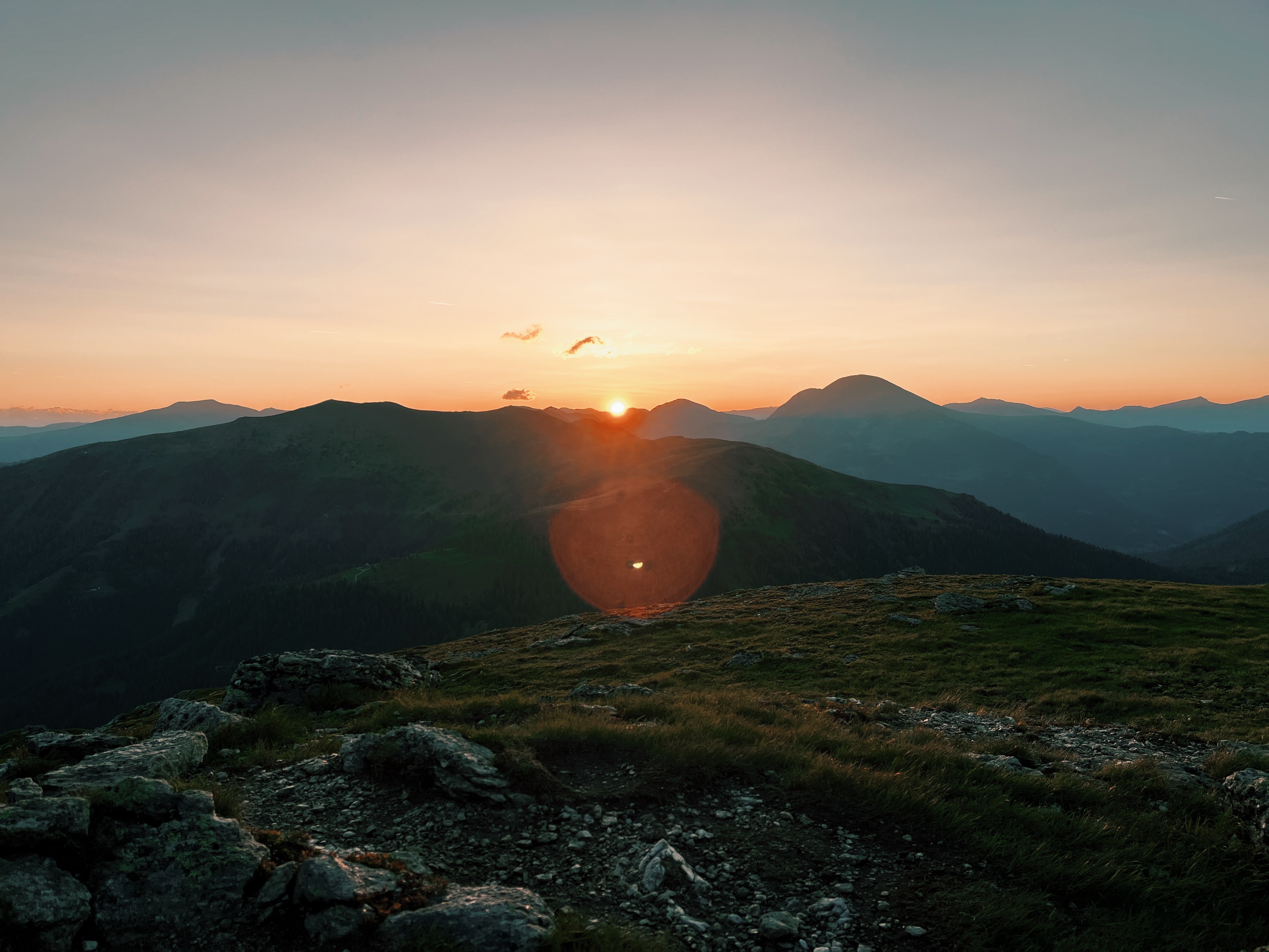 Sunrise over mountain scenary on the Alpe Adria Trail, a long-distance hiking trail in Europe